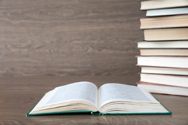 Book stack on wooden surface