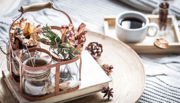 Book with a cup of coffee on the bed 