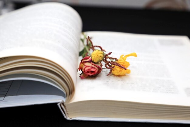 A book with a few flowers on it