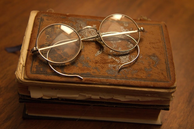 A book with a pair of glasses on it