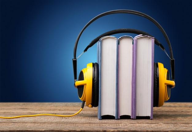 Book with Yellow headphones