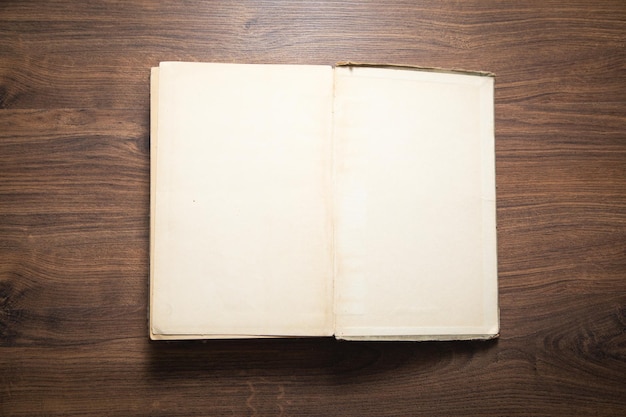 Book on the wooden background