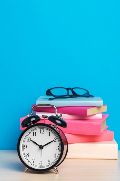 Books and alarm clock