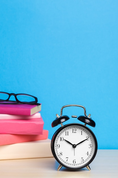  books and alarm clock