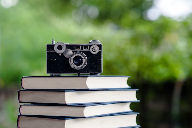 Books and Cameras Put on the floor. White leather Book and study The concept of empathy 