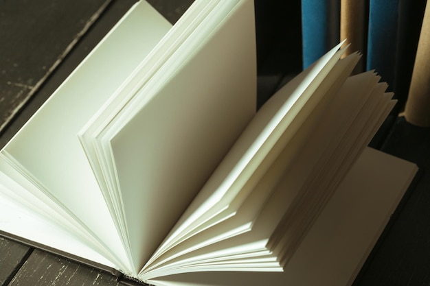 Books close up on old wooden table