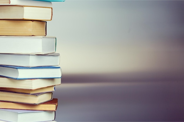 books collection in pile on background