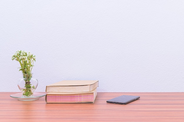 Books documents and stationery are on the desk