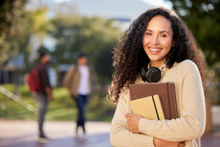 Photo books education and portrait of student woman on college or university campus for development or learning learning school or study and smile of happy person outdoor for academy scholarship