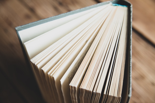 Books page on wooden desk