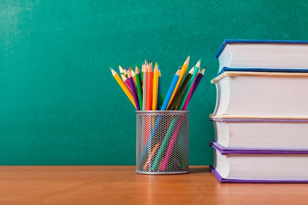 books and pencils on the desk