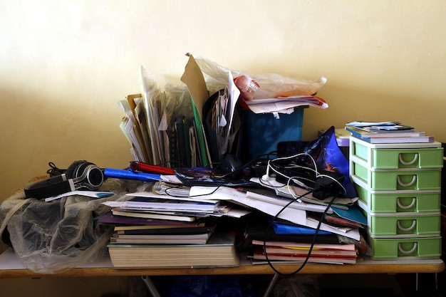 Photo books and personal accessories on table