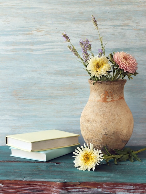 Books and vase of flowers, teachers day, back to school