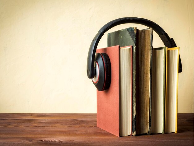 Photo books with headphones on table