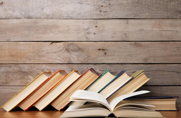 Books on the wooden background