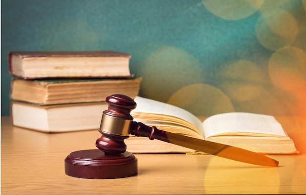 Books and wooden gavel, close-up view