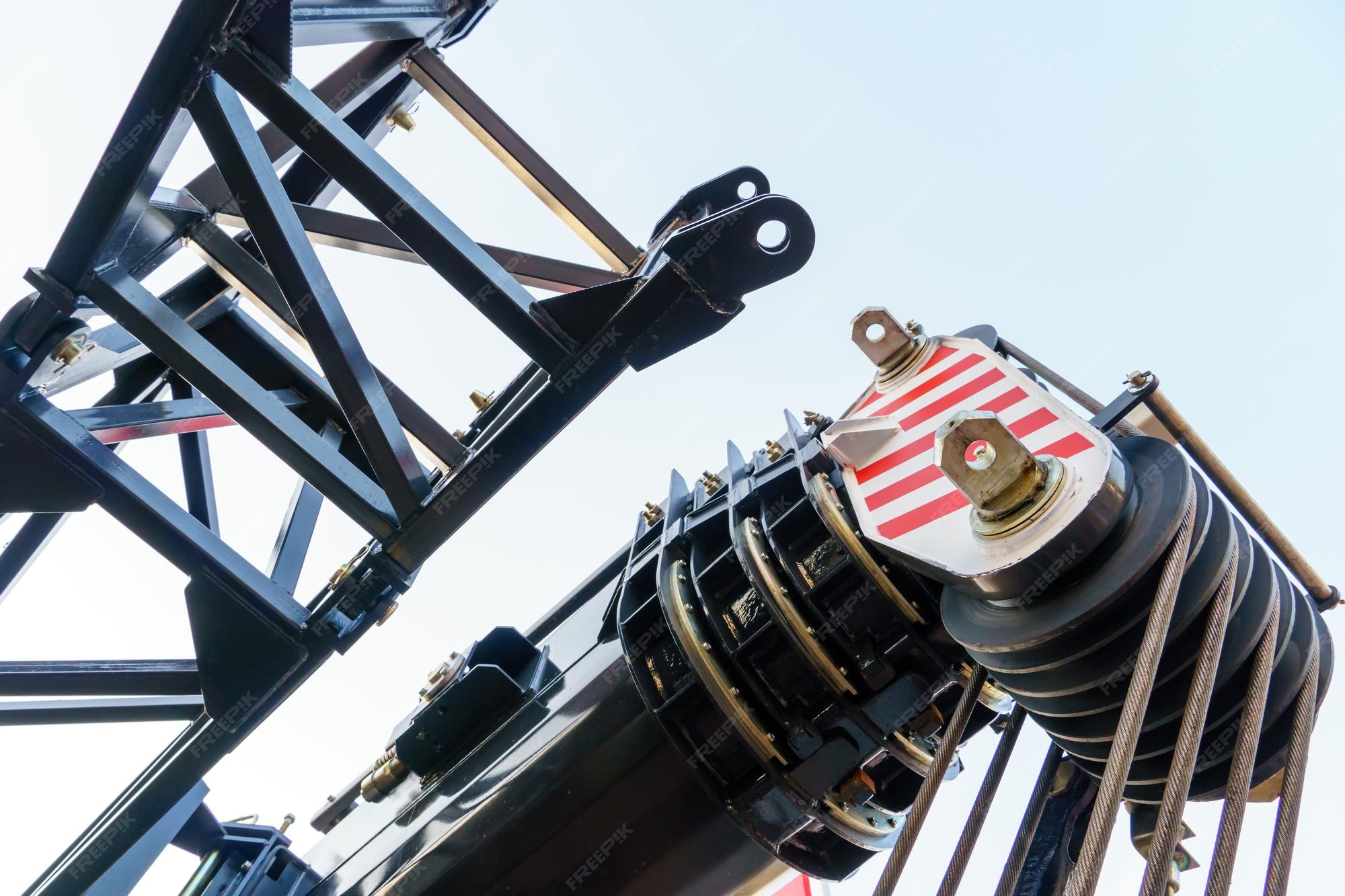 Premium Photo | The boom of a wheeled crane and a rope for lifting