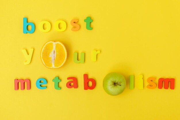 Photo boost your metabolism health concept top view yellow background