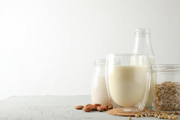 Bootle and glass of different types milk