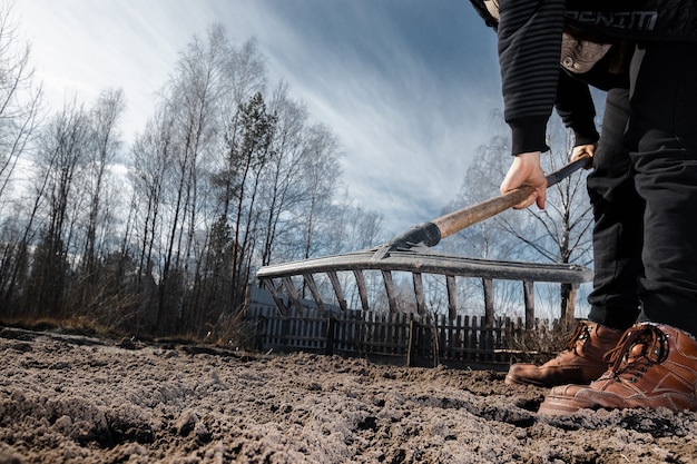 Boots and shovel closeup