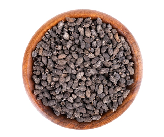 Borage seeds in wooden bowl isolated on a white background Borago officinalis seeds Top view