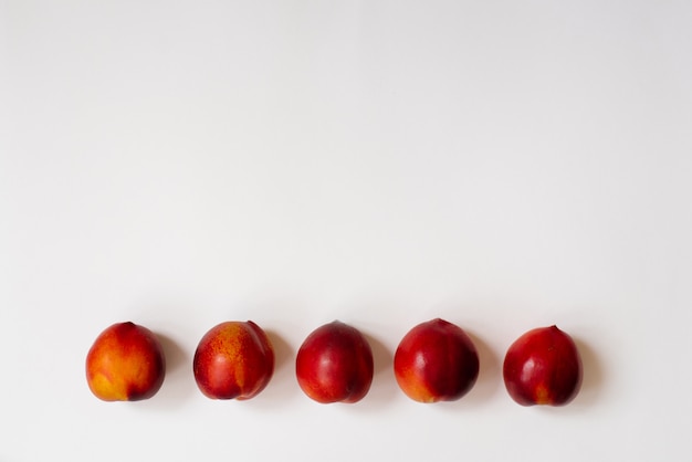 Border of fresh organic nectarine