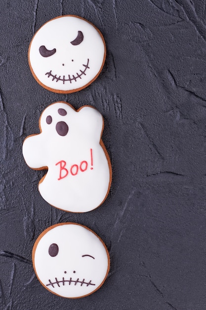 Border from white Halloween gingerbread cookies.