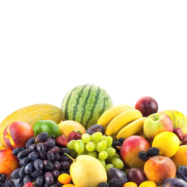 Border of mixed fruits isolated on white with copy space