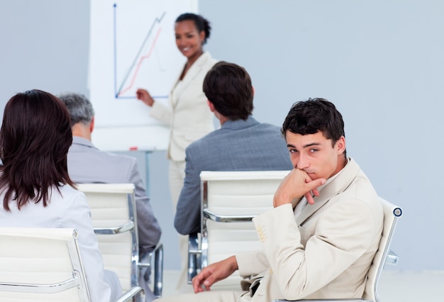 Bored businessman at a conference 