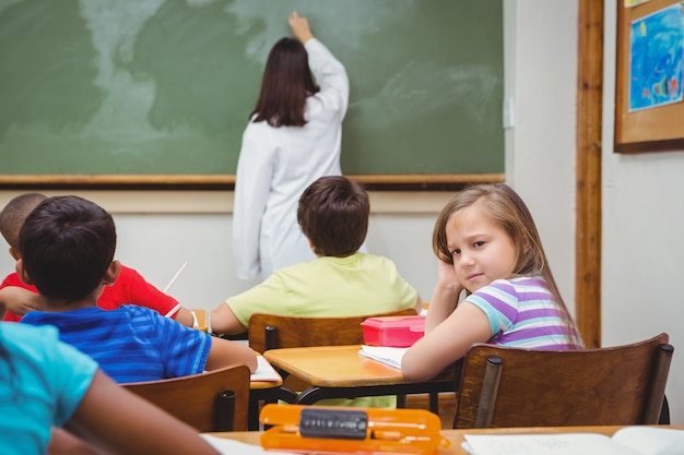 Bored student looking away from board