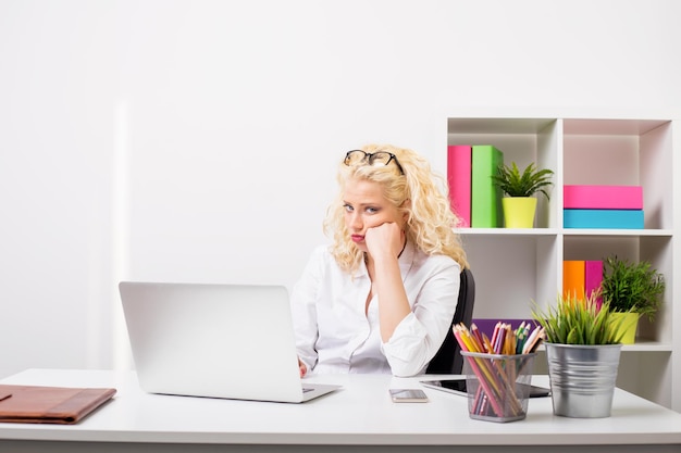 Bored woman in business office