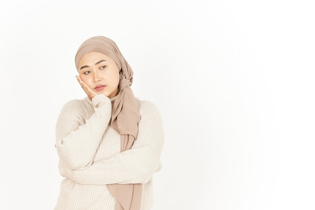 Boring Face Expression of Beautiful Asian Woman Wearing Hijab Isolated On White Background