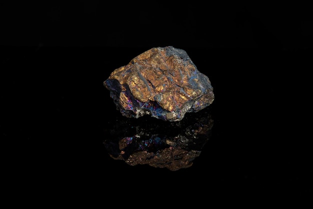 bornite chilean rock in black background