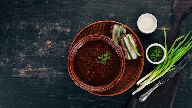 Borsch Ukrainian Traditional Cuisine Beetroot Soup On a wooden background Top view Copy space