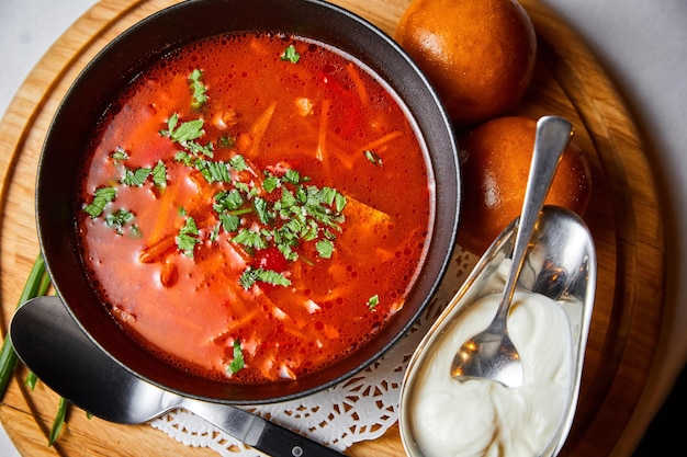 Borscht with sour cream and donuts