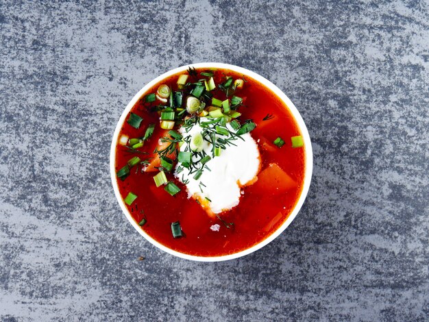 borscht with sour cream and greens