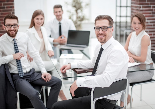 Boss and business team sitting at their Deskbusiness people