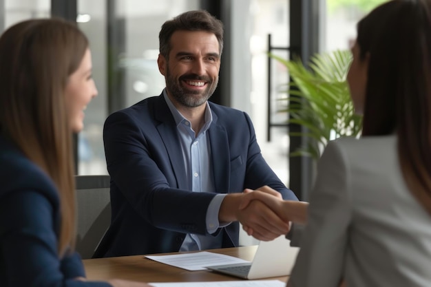 Boss recognizes and congratulates employee on promotion at meeting
