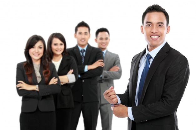 Boss standing in front of his team, leading to success