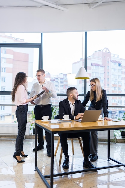 The boss stands with the charts, demonstrates statistics,
various personnel attending the training, introduces the company's
new products, reports on the results of work for partners.