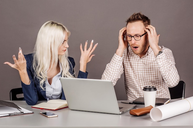 Photo boss yelling at woman after for disagreement misunderstanding or unfair treatment in workspace business conflict concept