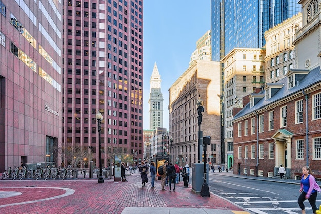 Boston, USA - April 28, 2015: Financial district at downtown Boston in MA, America. People on the background.