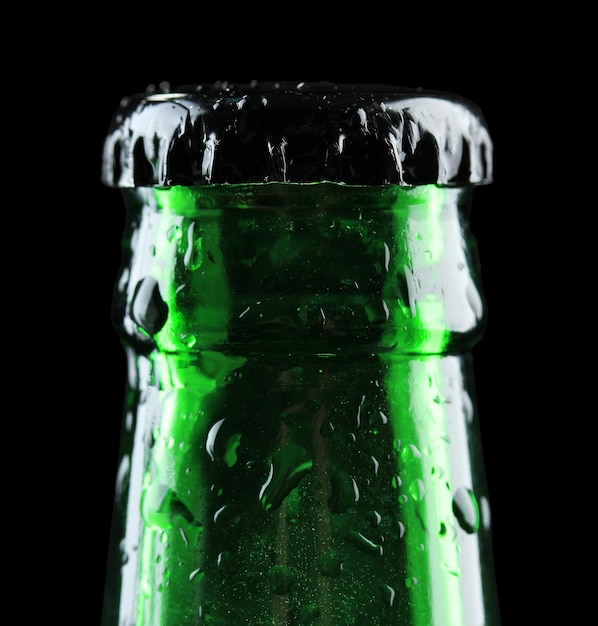 Bottle of beer on black background