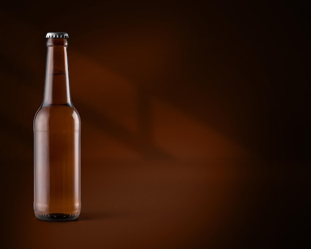 Bottle of beer on brown background