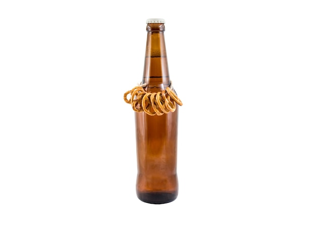 Bottle of beer with pretzels isolated on white