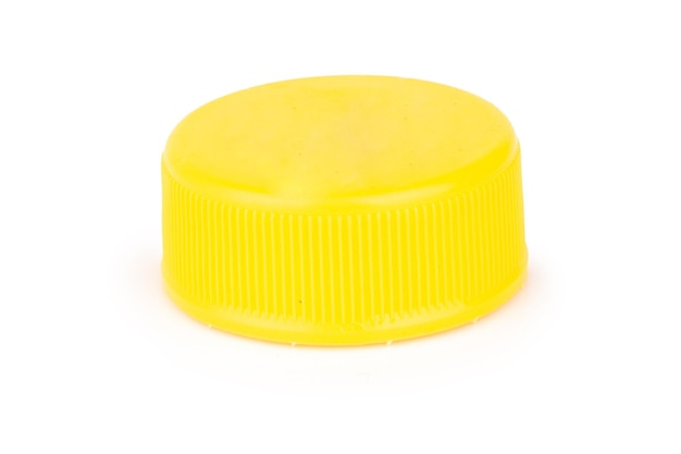 Bottle cap plastic yellow isolated on white background