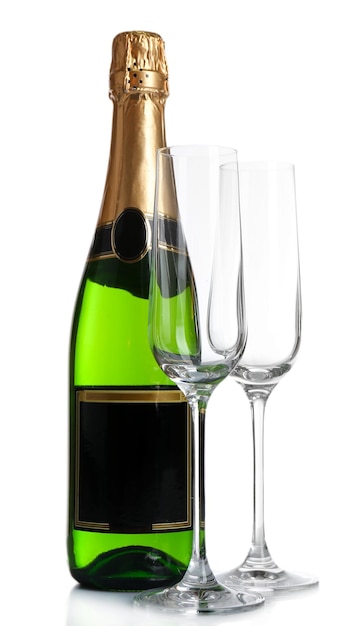 Bottle of champagne and empty glasses isolated on white