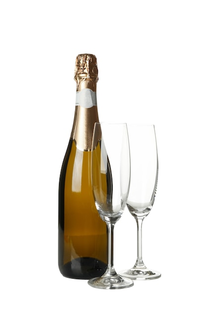 白で隔離のシャンパンとグラスのボトル