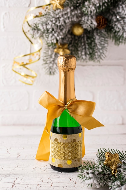 Bottle of champagne in a gold wrapper