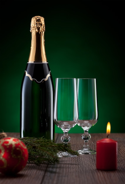 Bottle of champagne with two glasses